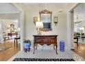 Welcoming foyer with hardwood floors, a decorative table, and elegant decor at 2473 Kings Arms Dr, Atlanta, GA 30345