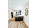 Eat-in kitchen with white countertops, new lighting, and stainless steel appliances at 948 Reed Ave, Atlanta, GA 30344