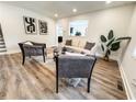 Bright living room with modern decor, hardwood floors, and comfortable seating arrangement at 948 Reed Ave, Atlanta, GA 30344