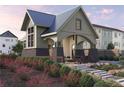 An attractive community clubhouse boasting a covered outdoor seating area and stone accented columns at 434 Argosy Park Cir # 13, Alpharetta, GA 30005