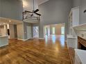 Bright, open living space with hardwood floors and staircase at 610 Brington Close, Alpharetta, GA 30022