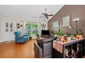 Cozy living room with hardwood floors, vaulted ceiling, and natural light from the window at 2591 Boulder Hill Se Ct, Atlanta, GA 30316