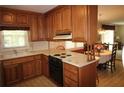 Eat-in kitchen featuring oak cabinets, and view to breakfast area at 2977 Karen Ln, Marietta, GA 30062