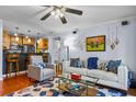 Open floor plan with a living room and bar with stainless steel appliances at 1445 Monroe Ne Dr # E25, Atlanta, GA 30324