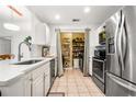 Modern kitchen features stainless steel appliances and granite countertops at 1101 Juniper Ne St # 1519, Atlanta, GA 30309