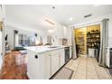 Open-concept kitchen boasts stone countertops, island, and lots of storage at 1101 Juniper Ne St # 1519, Atlanta, GA 30309