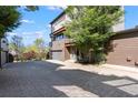 Wide stamped concrete driveway leading to an attached garage, complemented by attractive landscaping at 1331 Iverson Ne St # A, Atlanta, GA 30307