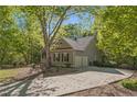 View of the side of the house featuring driveway and a two car garage at 160 Winter Park Ln, Powder Springs, GA 30127