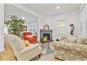 Cozy living room featuring comfortable seating and bright natural light, creating a welcoming atmosphere at 1463 Metropolitan Sw Pkwy, Atlanta, GA 30310