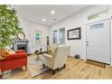 Bright living room with lots of natural light, fireplace, and neutral decor, perfect for relaxation at 1463 Metropolitan Sw Pkwy, Atlanta, GA 30310