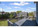 Spacious wooden deck overlooking a flat grassy yard, perfect for outdoor entertaining at 5153 Elkins Ln, Acworth, GA 30101