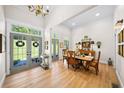 Bright dining room with wood floors, complemented by elegant furnishings and natural light at 88 Cline Smith Ne Rd, Cartersville, GA 30121