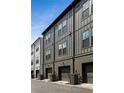 View of modern townhomes with garages at 913 Spencer Ave, Atlanta, GA 30318