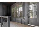 Front porch featuring an entrance door with glass panes and the house number at 913 Spencer Ave, Atlanta, GA 30318