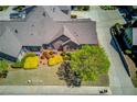 An aerial view showcasing the roof, landscaping, and brick detailing of this well-maintained home at 4321 Lanier Ridge Walk # 1704, Cumming, GA 30041