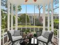 Cozy sunroom with comfortable seating, great natural light, and outdoor views at 55 Delmont Ne Dr # D1, Atlanta, GA 30305