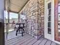 Comfortable front porch with seating, perfect for enjoying the outdoors at 716 Crimson Morning Vw, Canton, GA 30114