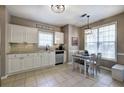 Well-lit kitchen features stainless steel appliances, granite countertops, and neutral decor at 2186 Mainsail Dr, Marietta, GA 30062