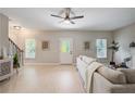 Bright living room with wood floors, neutral walls, and staircase at 22 Haygood Se Ave, Atlanta, GA 30315