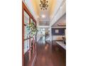 Spacious foyer features a high ceiling, hardwood floors, and white wainscoting at 416 Battlefield Creek Dr, Marietta, GA 30064