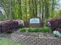 Welcoming Spring Meadow Swim/Tennis Community sign with landscaping at 3861 Spring Meadow Dr, Acworth, GA 30101