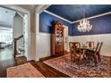 Dining room featuring a blue ceiling and hardwood floors at 144 Park Dr, Decatur, GA 30030