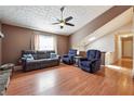 Cozy living room with wood floors, a large window, and comfortable seating at 2816 Pine Meadow Dr, Marietta, GA 30066