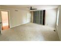 Bright bedroom with closet and ceiling fan at 3312 Winter Wood Ct, Marietta, GA 30062
