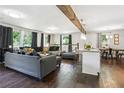 Open floor plan featuring a spacious living room with hardwood floors at 877 Lee Andrews Se Ave, Atlanta, GA 30315