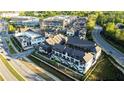 An aerial view of a meticulously planned neighborhood, showcasing modern architecture and thoughtful landscaping at 6666 Sterling Dr, Sandy Springs, GA 30328