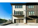 Charming townhome with a private balcony, garage, and well-maintained exterior at 6666 Sterling Dr, Sandy Springs, GA 30328