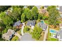 A high angle shot that reveals the property's location and its position within the surrounding neighborhood at 3105 Birchton St, Johns Creek, GA 30022