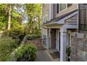 Charming front porch with stone accents and a welcoming entrance perfect for relaxing at 2400 Cumberland Se Pkwy # 803, Atlanta, GA 30339