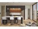 Stylish kitchen with a dark modern design, island seating, and stainless steel appliances at 318 Sandy Springs Cir # 130, Sandy Springs, GA 30328