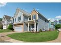 Beautiful two-story home with a well-maintained lawn and inviting front porch at 400 Mirramont Ln, Woodstock, GA 30189