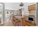 Bright kitchen with stone countertops, stainless appliances, and hardwood floors at 541 Lombard St, Marietta, GA 30064