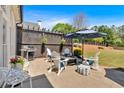 Outdoor patio with seating around a fire pit, great for entertaining guests at 541 Lombard St, Marietta, GA 30064