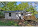 Exterior of home with wooden deck and grassy backyard at 1346 Wichita Sw Dr, Atlanta, GA 30311