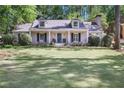 Inviting single-story home with a manicured lawn and a cozy, classic style at 2567 Hyde Manor Nw Dr, Atlanta, GA 30327