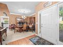 Inviting entryway showcasing hardwood floors and an open view into the dining room and living area at 614 Springharbor Dr, Woodstock, GA 30188