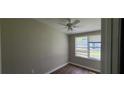 Bedroom with wood-look flooring and natural light from the large window at 2917 Joe Jerkins Blvd, Austell, GA 30106