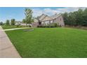 Well-manicured lawn and landscaping enhance this home's curb appeal at 6340 Arlington Cir, Cumming, GA 30041
