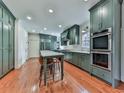 Gourmet kitchen featuring an eat-in island and modern appliances at 1594 Stoddard Nw Ct, Kennesaw, GA 30152