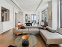 Expansive living room boasts hardwood floors, neutral tones, and a spacious layout perfect for modern living at 3376 Peachtree Ne Rd # 44B, Atlanta, GA 30326