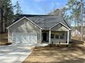 Well-maintained single-Gathering home with a 2-car garage and a pristine, neatly-kept front yard at 5096 Cumberland Ct, Villa Rica, GA 30180