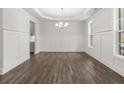 Bright and spacious dining room with crown molding, hardwood floors, and large windows at 76 Parkview Dr, Dallas, GA 30157