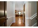 Inviting hallway featuring hardwood floors and access to other rooms at 2921 Huntcliff Dr, Marietta, GA 30066