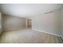 Spacious living room with neutral carpeting and ample natural light at 2921 Huntcliff Dr, Marietta, GA 30066