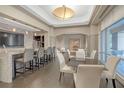 Inviting common area with a dining table, bar, and large windows for natural light at 3475 Oak Valley Rd # Apt 650, Atlanta, GA 30326