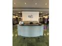 A sleek reception desk stands on a marble floor in a well-lit lobby at 799 Hammond Dr # 321, Atlanta, GA 30328